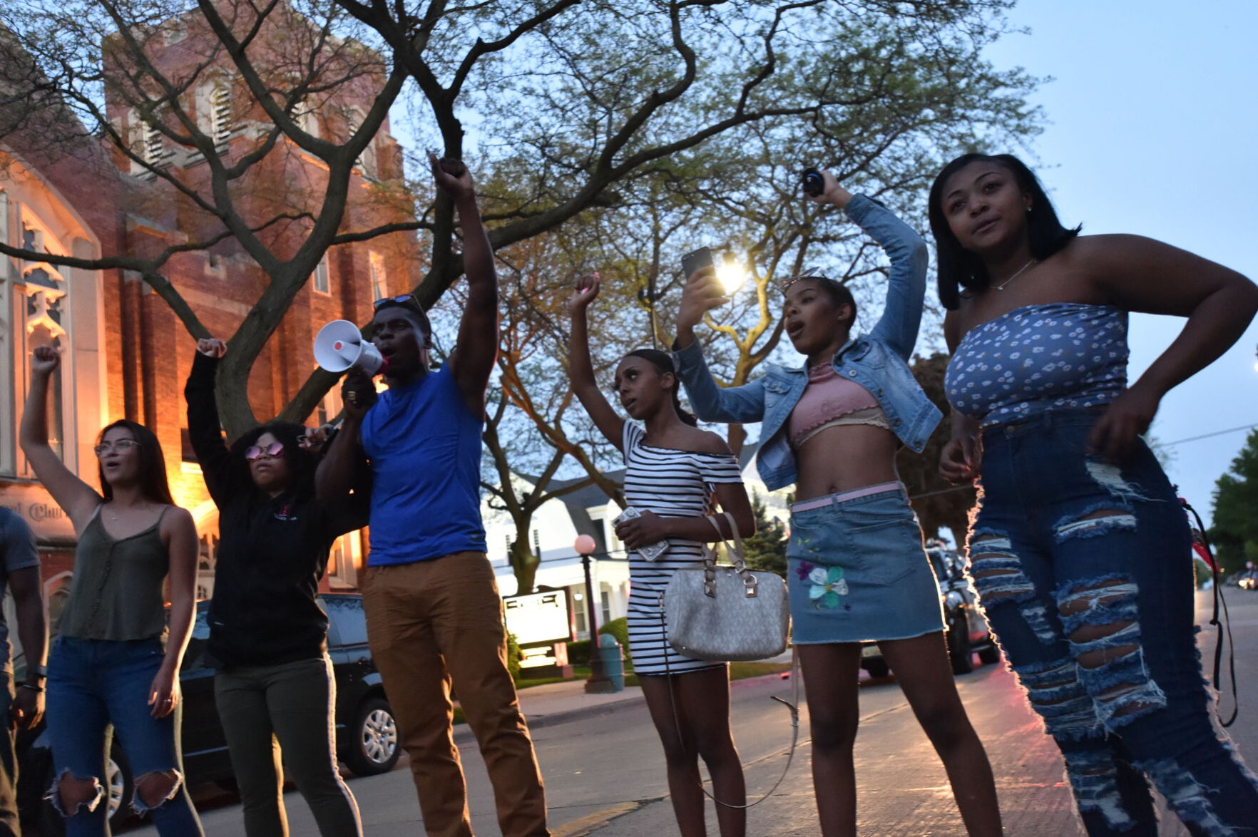Fists up outside Racine County Jail